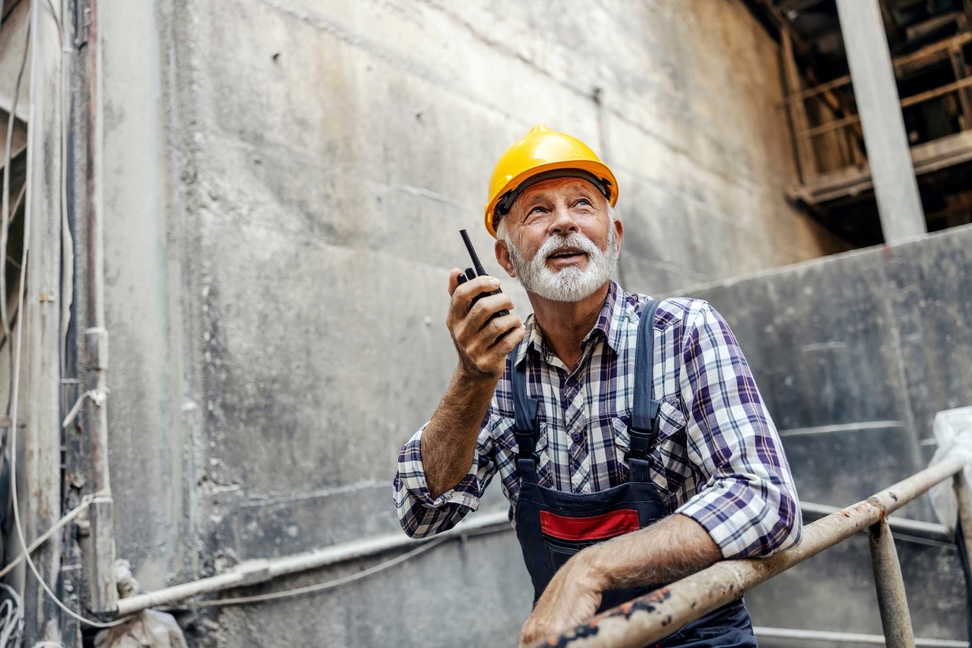 A senior worker in a factory.